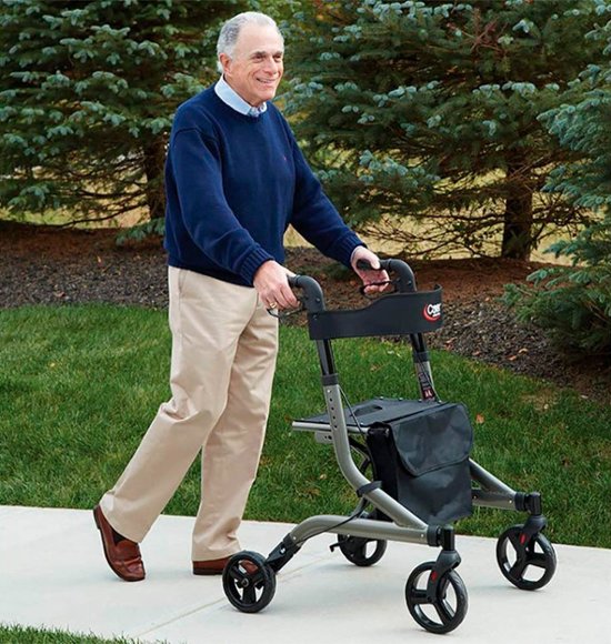 Man with freedom and independence using his mobility device, a rollator